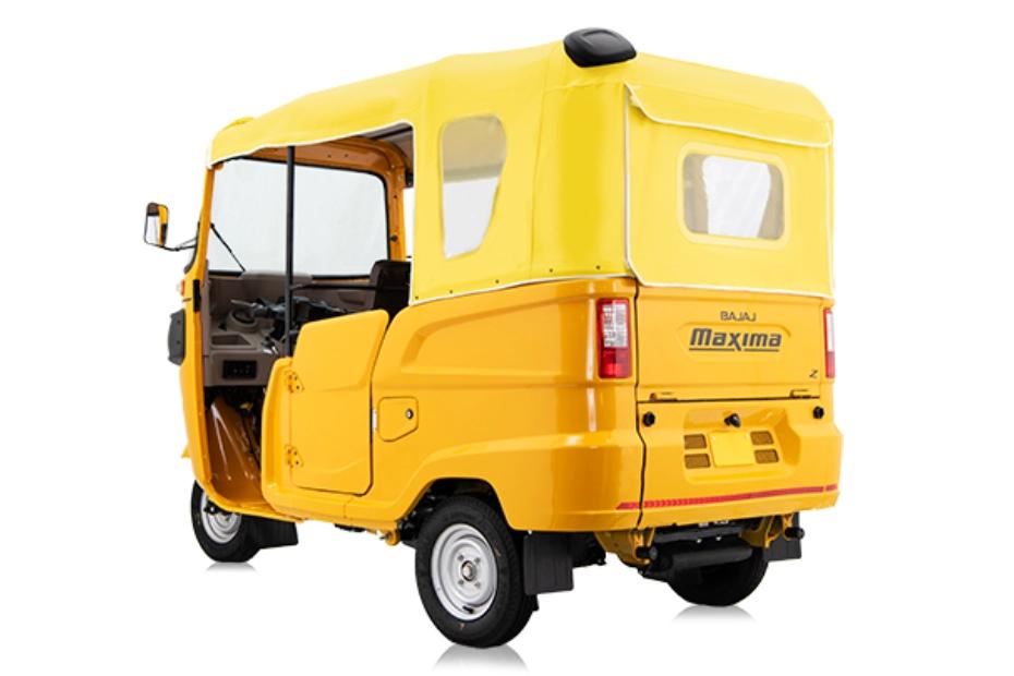 Bajaj Maxima Z Golden-Yellow Left Rear Three Quarter Bajaj Maxima Z Golden-Yellow Left Rear Three Quarter
