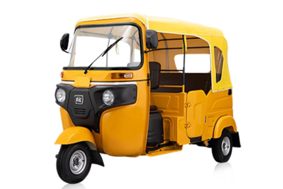 Bajaj RE Golden Yellow Left Front Three Quarter Bajaj RE Golden Yellow Left Front Three Quarter