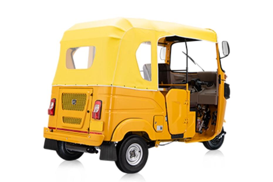 Bajaj RE Golden Yellow Right Rear Three Quarter Bajaj RE Golden Yellow Right Rear Three Quarter