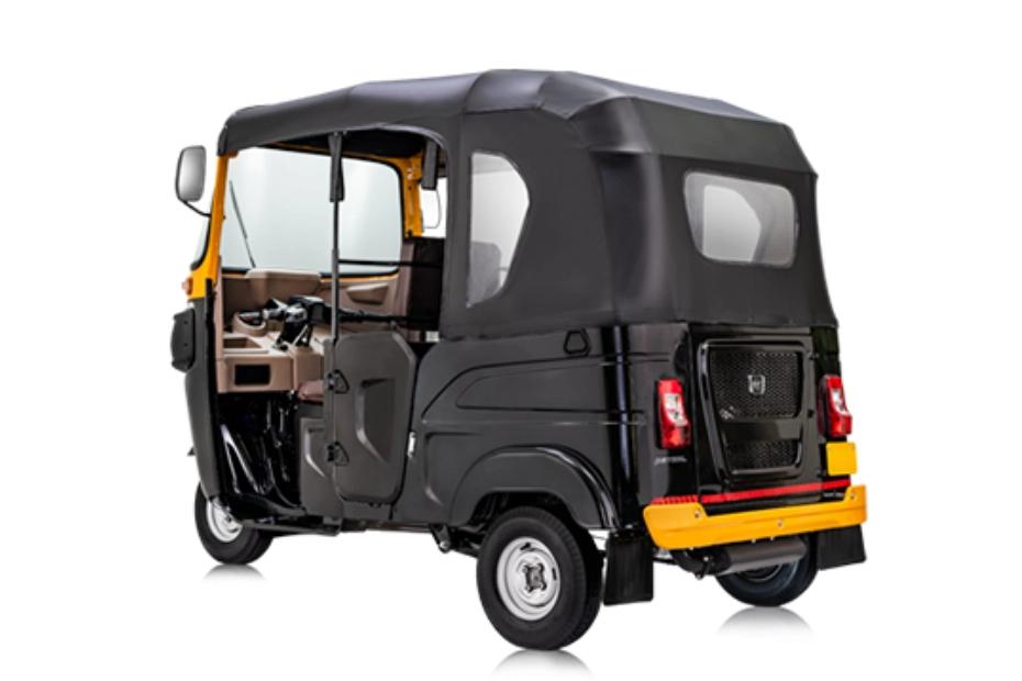 Bajaj RE Black Yellow Left Rear Three Quarter Bajaj RE Black Yellow Left Rear Three Quarter