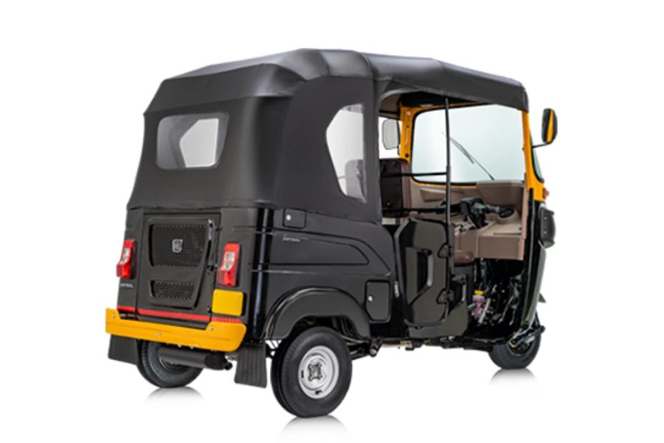 Bajaj RE Black Yellow Right Rear Three Quarter Bajaj RE Black Yellow Right Rear Three Quarter