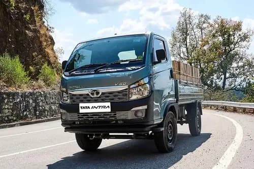 Tata Intra V50 LNT front face view - grille headlight design mountain road mini truck India 2026 Tata Intra V50 LNT front face view - grille headlight design mountain road mini truck India 2026
