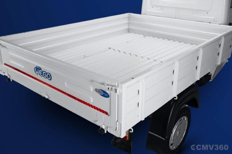 Bajaj WEGO C90 electric three-wheeler cargo bed with white loading platform Bajaj WEGO C90 electric three-wheeler cargo bed with white loading platform