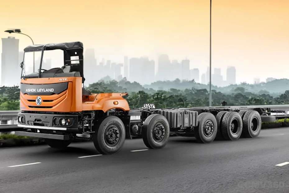 Ashok Leyland AVTR 4625H LA truck in orange - front three-quarter view, in motion Ashok Leyland AVTR 4625H LA truck in orange - front three-quarter view, in motion