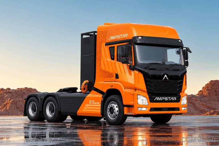 Ampstar 55T Tractor Trailer orange electric truck front three-quarter rocky view Ampstar 55T Tractor Trailer orange electric truck front three-quarter rocky view