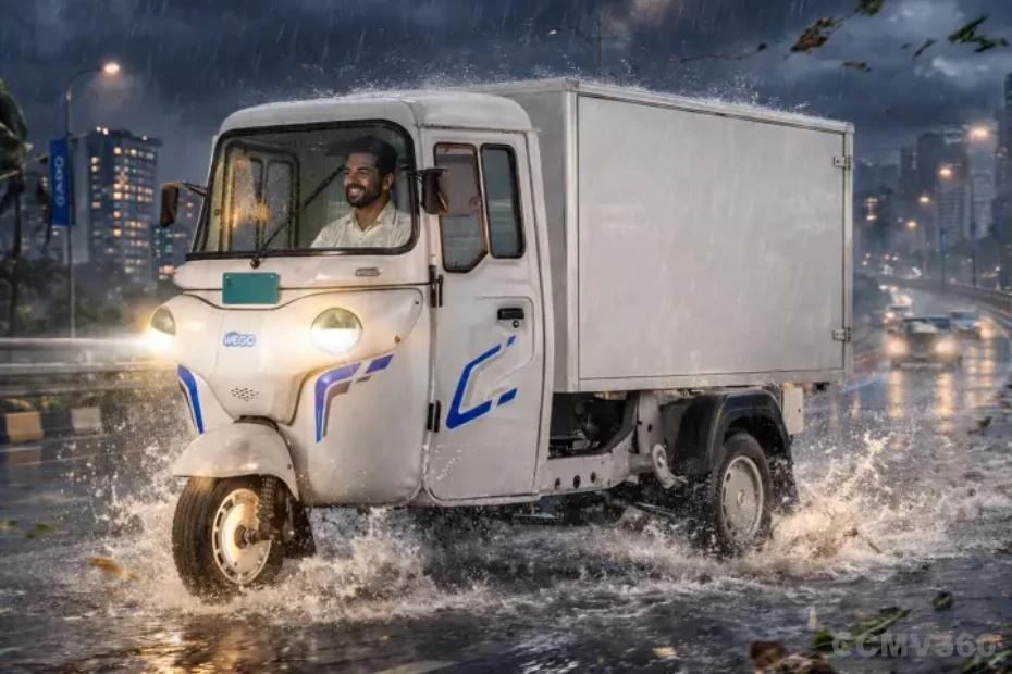 Bajaj WEGO C90 electric cargo three-wheeler with covered box body driving in rainy weather Bajaj WEGO C90 electric cargo three-wheeler with covered box body driving in rainy weather