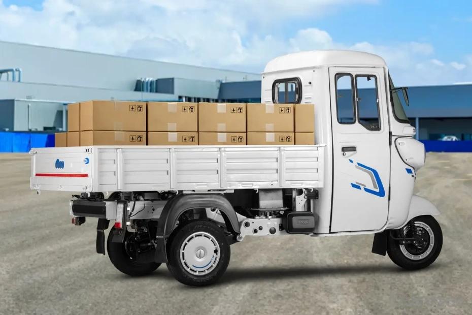 Bajaj WEGO C90 electric cargo three-wheeler carrying cardboard boxes for commercial delivery Bajaj WEGO C90 electric cargo three-wheeler carrying cardboard boxes for commercial delivery