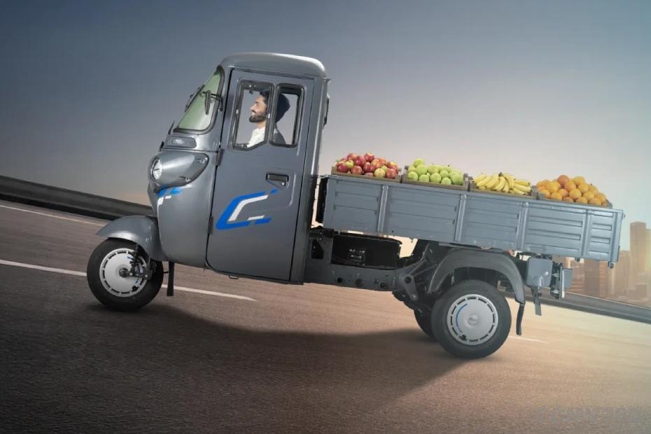 Bajaj WEGO C90 electric three-wheeler carrying fruits for cargo delivery Bajaj WEGO C90 electric three-wheeler carrying fruits for cargo delivery