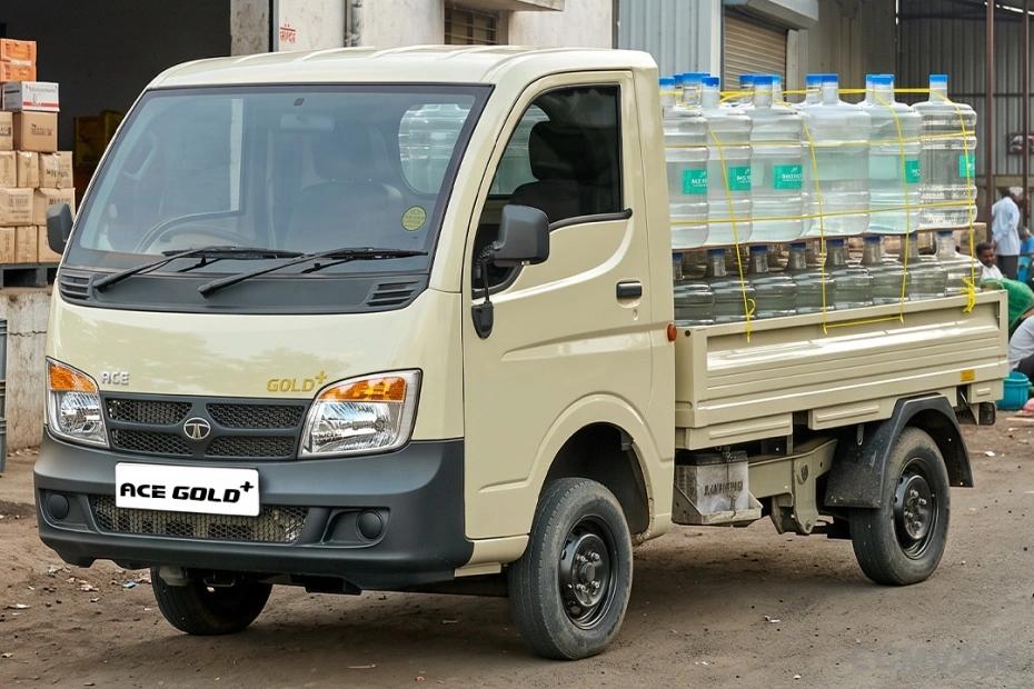 Tata Ace Gold Plus Beige Colour Mini Truck Right Front Side view showing Water Bottle Cargo Tata Ace Gold Plus Beige Colour Mini Truck Right Front Side view showing Water Bottle Cargo