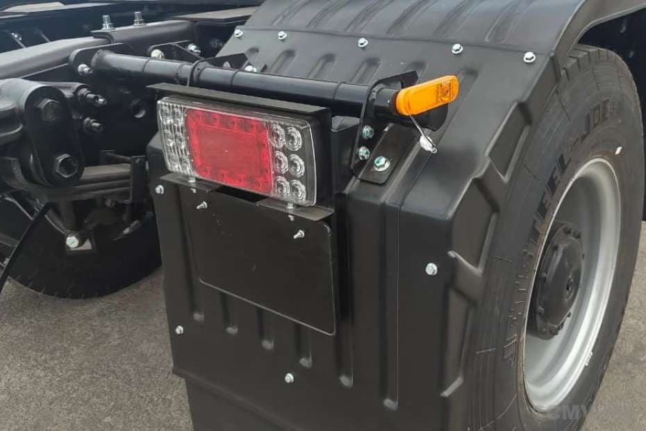 Blue Energy 5548e EV electric truck rear tail light and mudguard close-up Blue Energy 5548e EV electric truck rear tail light and mudguard close-up