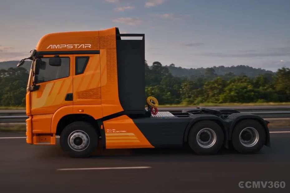 Ampstar 55T Tractor Trailer orange electric truck side view on highway Ampstar 55T Tractor Trailer orange electric truck side view on highway