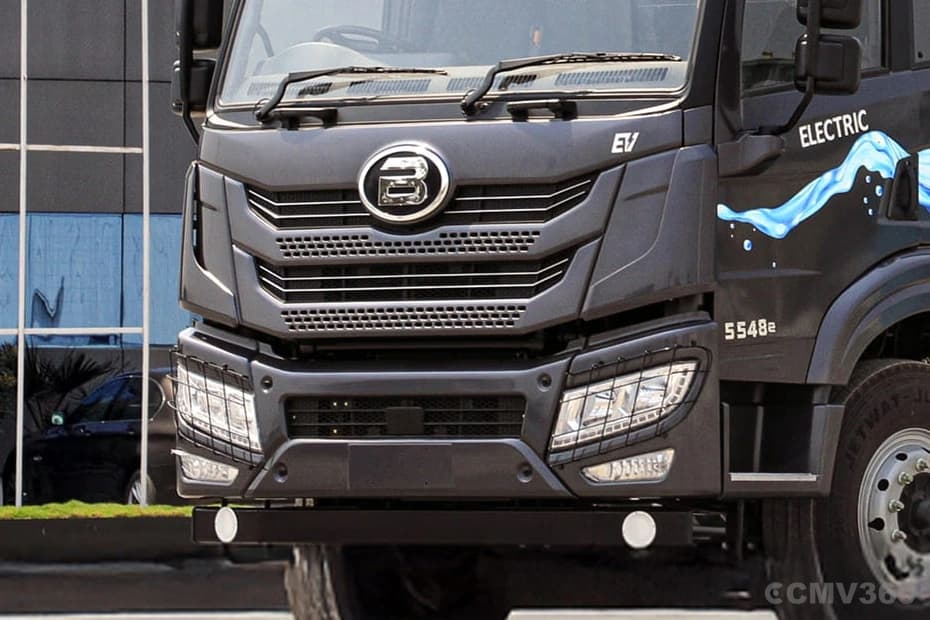 Blue Energy 5548e EV electric truck front grille and headlamp close-up Blue Energy 5548e EV electric truck front grille and headlamp close-up