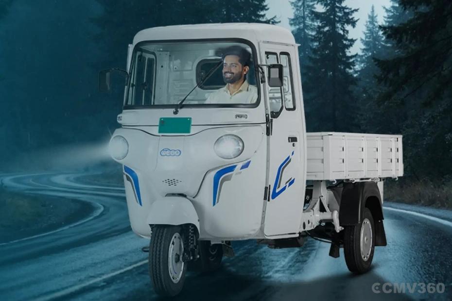 Bajaj WEGO C90 electric cargo three-wheeler driving on a forest road Bajaj WEGO C90 electric cargo three-wheeler driving on a forest road