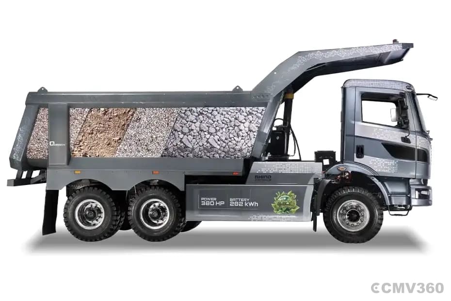 Montra Electric Rhino 2838EV right side profile view with elevated tipper body showing 380HP power and 282 kWh battery graphics Montra Electric Rhino 2838EV right side profile view with elevated tipper body showing 380HP power and 282 kWh battery graphics