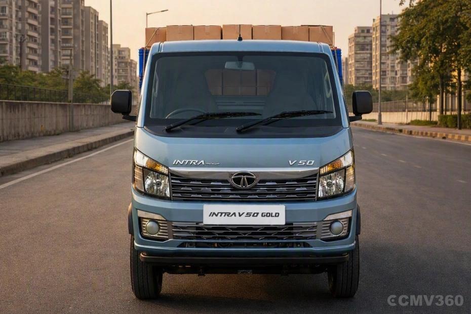 Tata Intra V50 Gold Teal Blue Colour Mini Truck Bold Front Exterior View showing Front Grille and Front Headlight Design Tata Intra V50 Gold Teal Blue Colour Mini Truck Bold Front Exterior View showing Front Grille and Front Headlight Design