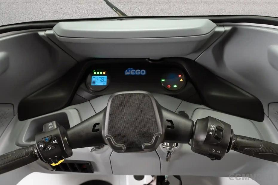 Bajaj WEGO C90 electric three-wheeler digital instrument cluster and handlebar controls Bajaj WEGO C90 electric three-wheeler digital instrument cluster and handlebar controls