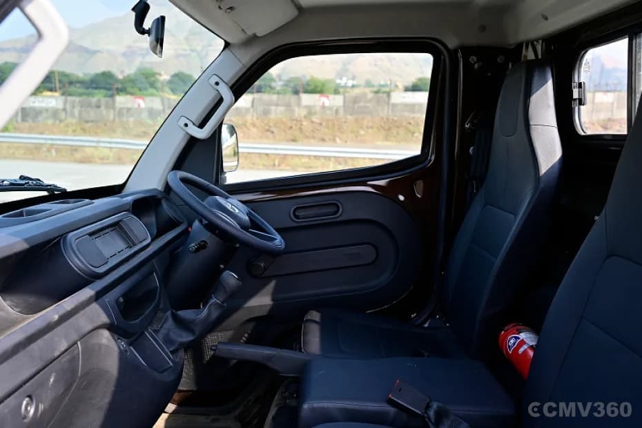 Tata Intra V40 interior cabin view with steering wheel and driver seat Tata Intra V40 interior cabin view with steering wheel and driver seat